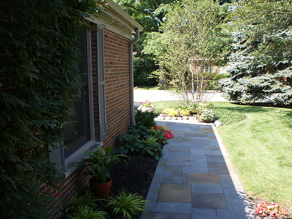 Vista Landscape offers a wide range of hardscapes, including Retaining Walls, Steps, Stone Paths, Brick Paving, Natural Stone Paving, Patios, Walkways, and Driveways.